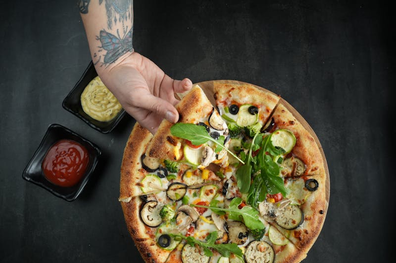 Truffle mushroom pizza with arugula topping