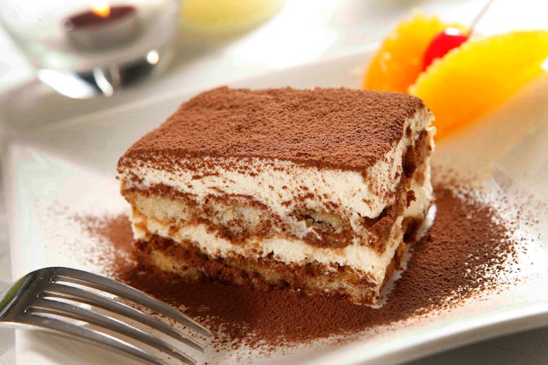 Classic Italian tiramisu with cocoa dusting