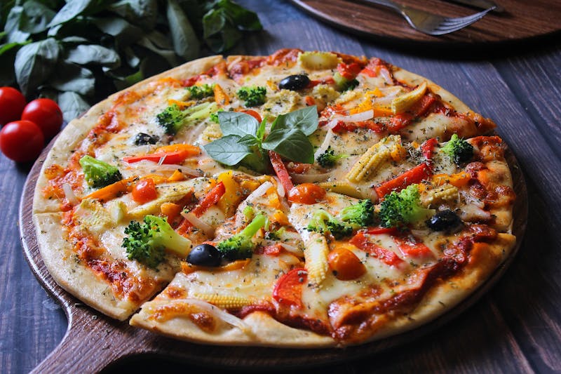 Seasonal toppings and fresh ingredients for pizza